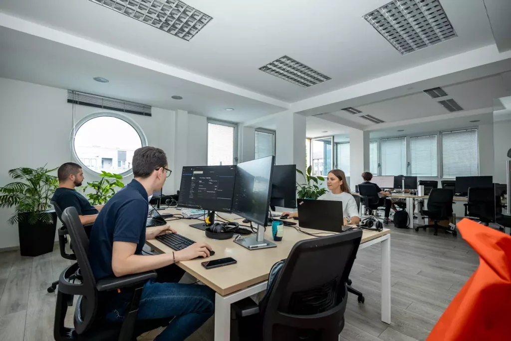Software engineers working in a vibrant office environment